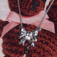 Pierced Baby Bow Necklace / Silver